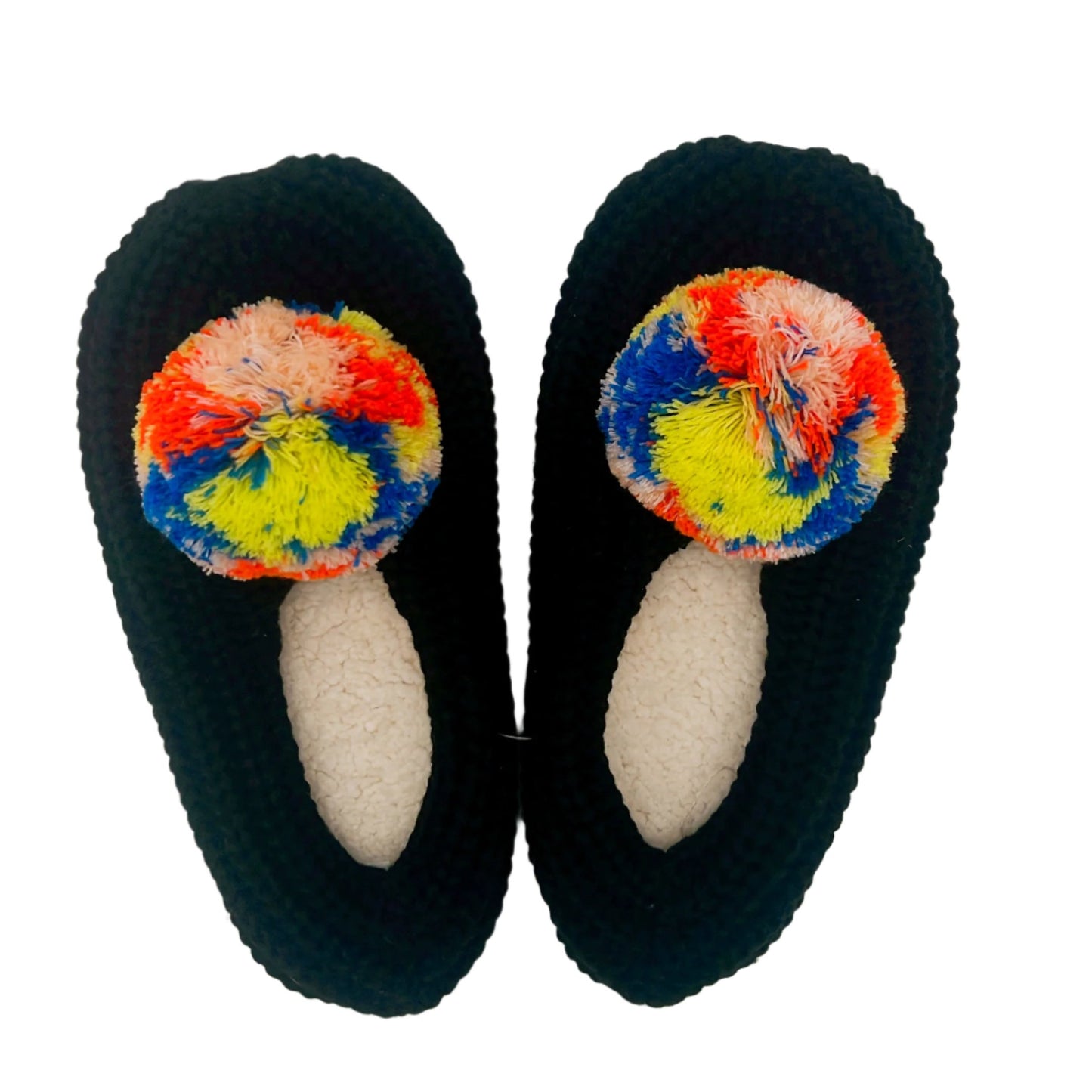 Verloop knit slippers made from deadstock yarn, featuring a cozy, handcrafted design in vibrant colors, perfect for sustainable and eco-friendly lounging.