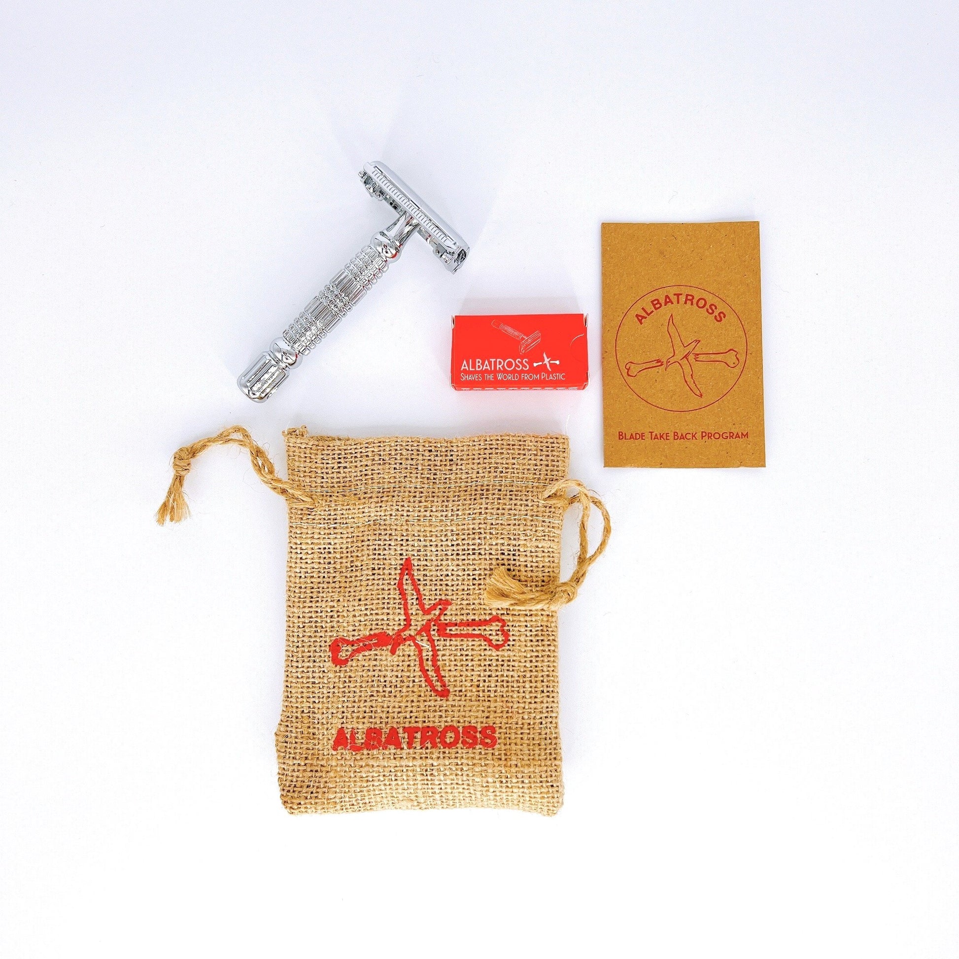 Albatross double-edge safety razor with a stainless steel handle and replaceable blade.