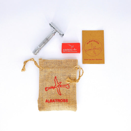 Albatross double-edge safety razor with a stainless steel handle and replaceable blade.