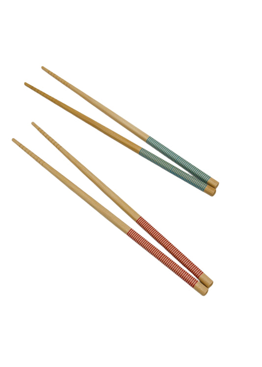 A pair of sleek, eco-friendly bamboo chopsticks with a smooth, natural finish. These lightweight, reusable chopsticks are designed for durability and a comfortable grip. Perfect for everyday meals or special occasions, they offer a sustainable alternative to disposable utensils, reflecting Bamboo Switch’s commitment to environmentally conscious living.