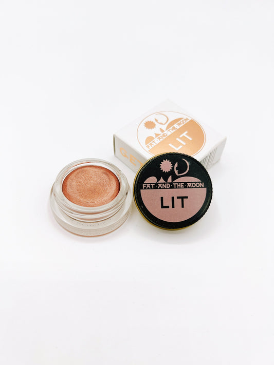 Fat and the Moon Lit Highlighter, a natural, glowing highlighter that enhances your complexion with a radiant, luminous finish.