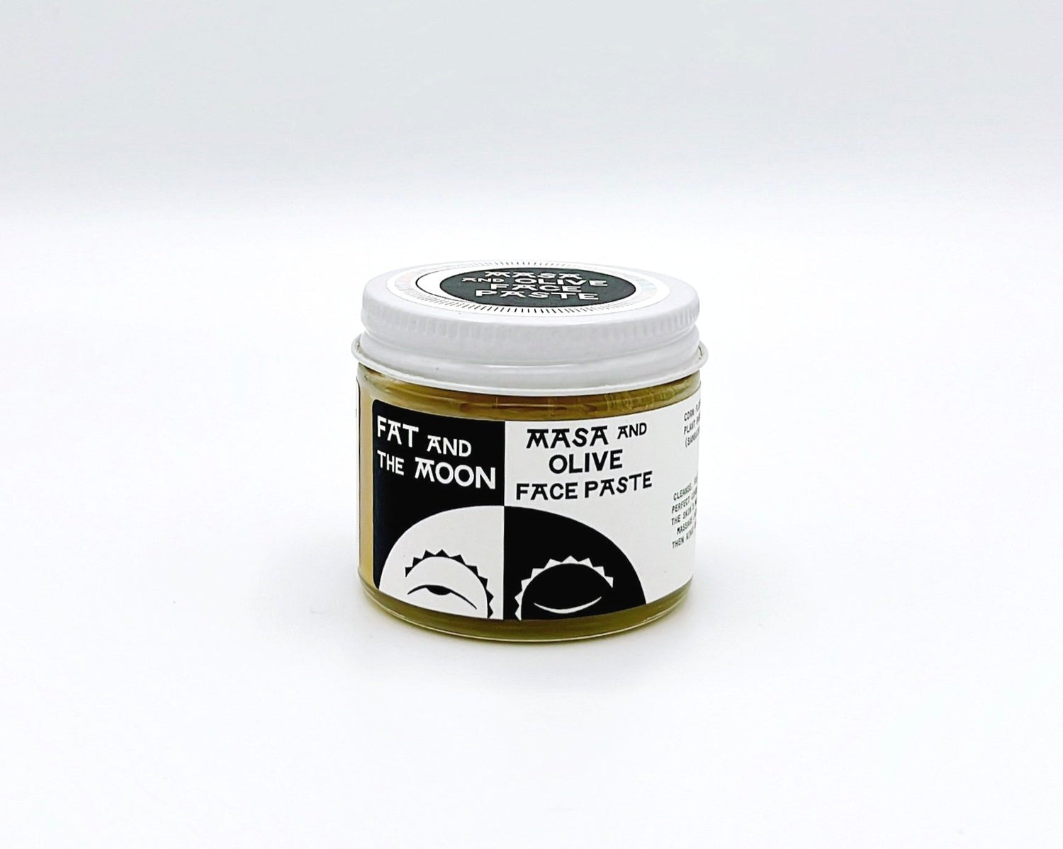 Fat and the Moon Masa and Olive Face Paste, a natural skincare product that exfoliates and nourishes, promoting a smooth, glowing complexion.