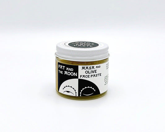 Fat and the Moon Masa and Olive Face Paste, a natural skincare product that exfoliates and nourishes, promoting a smooth, glowing complexion.