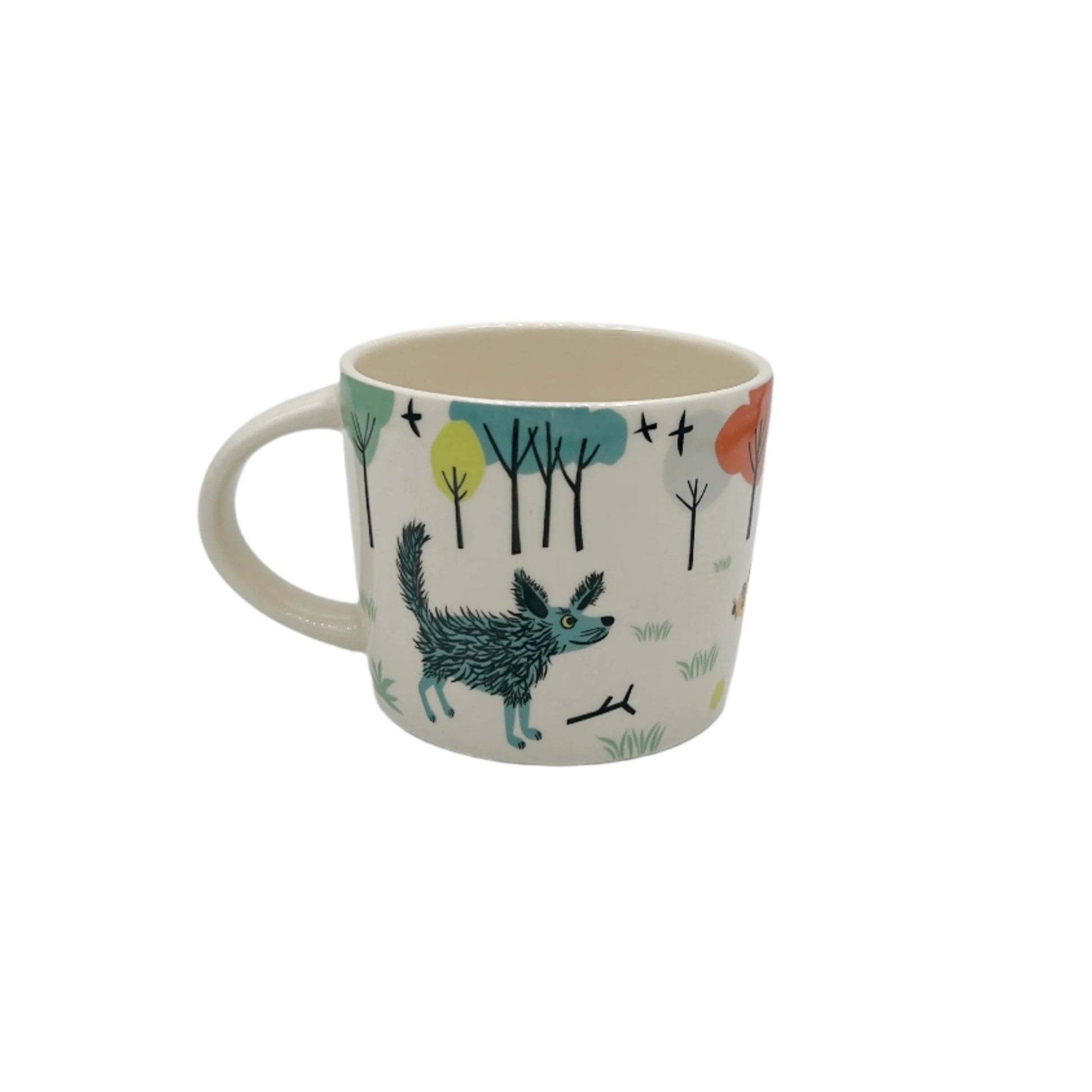 Handmade Hannah Turner Ceramic Dog Mug featuring a whimsical dog design, perfect for coffee or tea lovers.