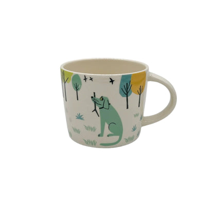 Handmade Hannah Turner Ceramic Dog Mug featuring a whimsical dog design, perfect for coffee or tea lovers.