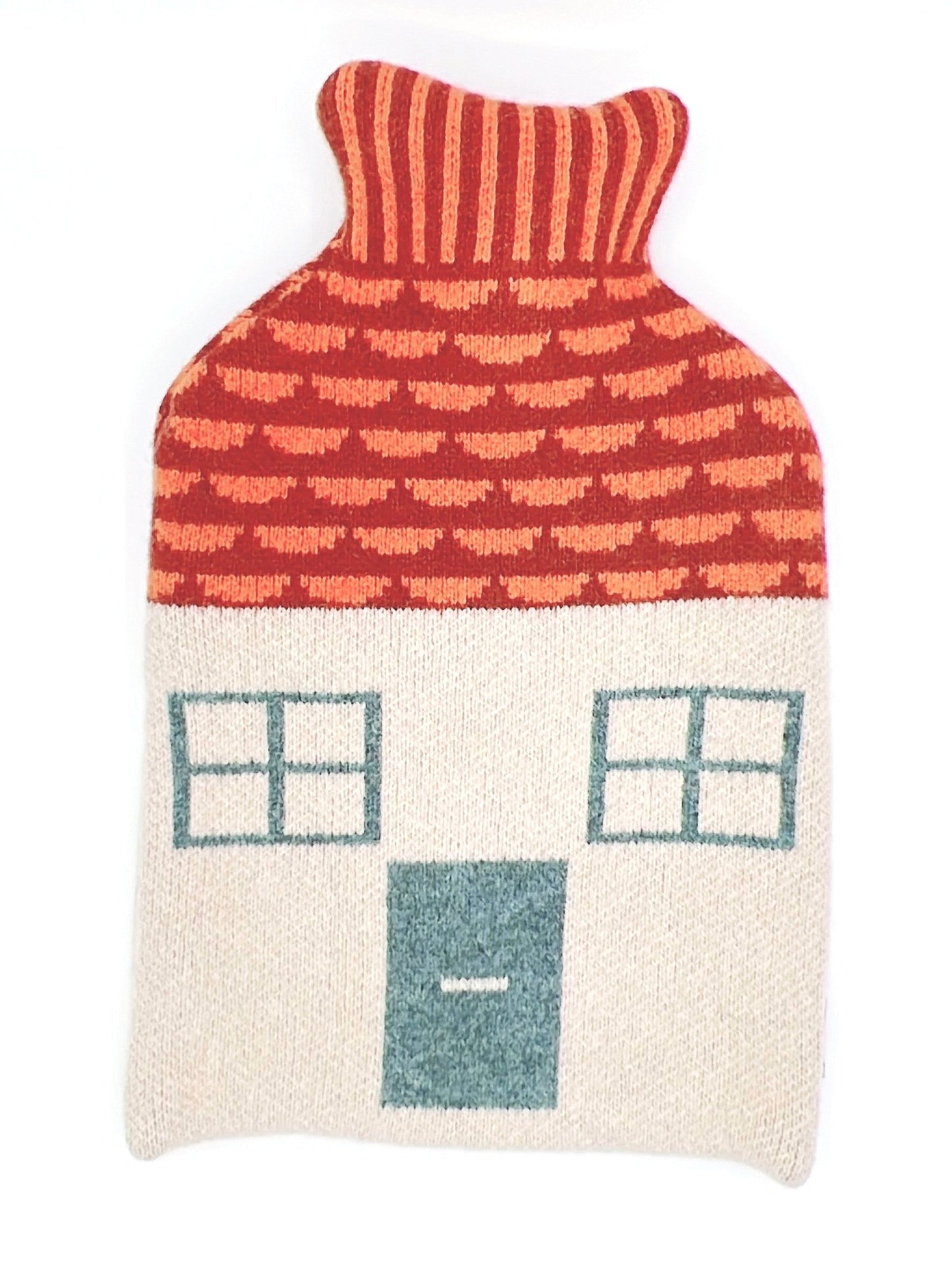 Donna Wilson Hot Water Bottle, cozy house cover made from knitted lamb's wool, perfect for warmth and comfort.