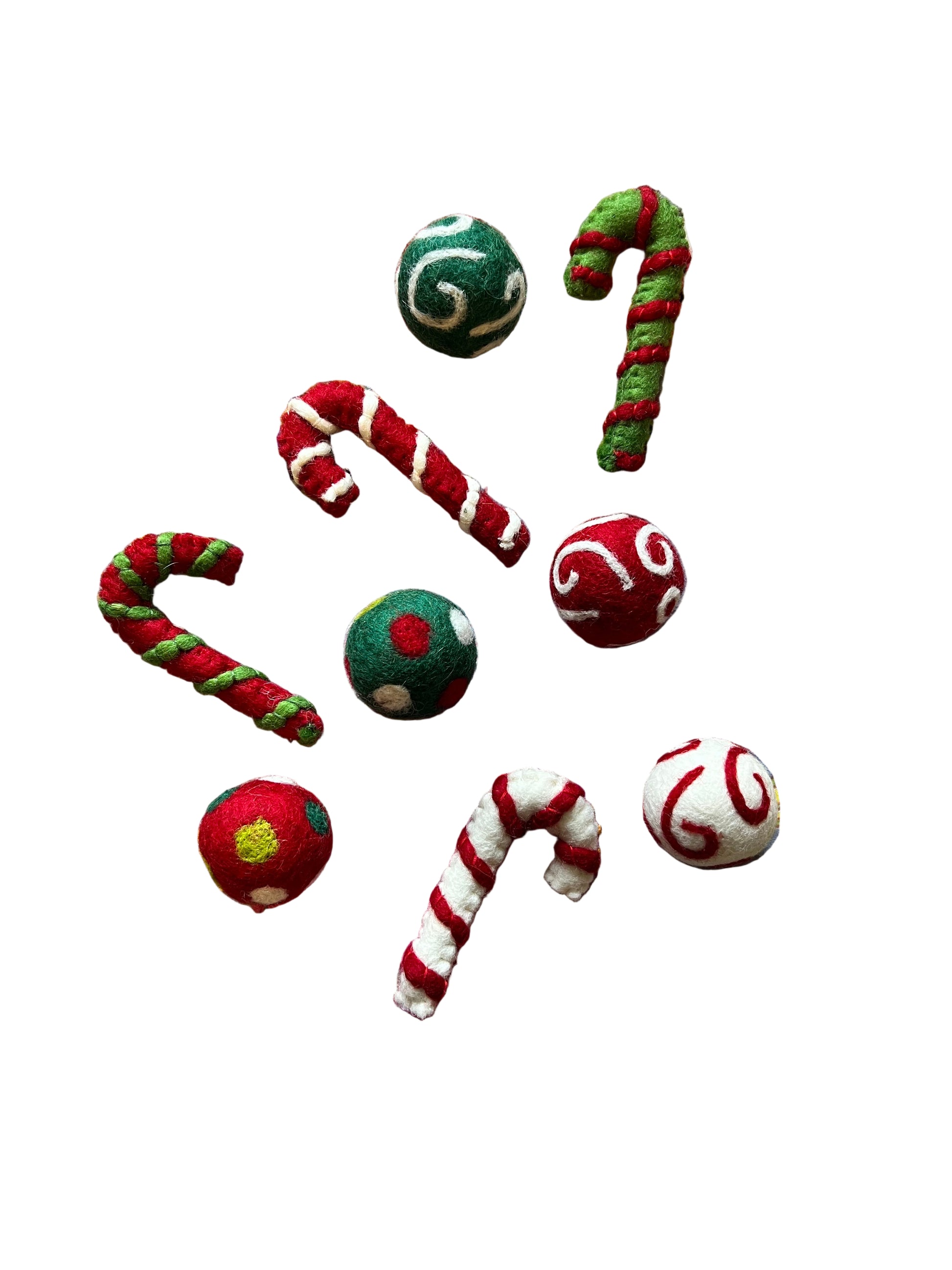 Karma Cat Holiday Wool Toys — handmade festive cat toys in ball and candy cane shapes, eco-friendly and fun for cats of all ages.