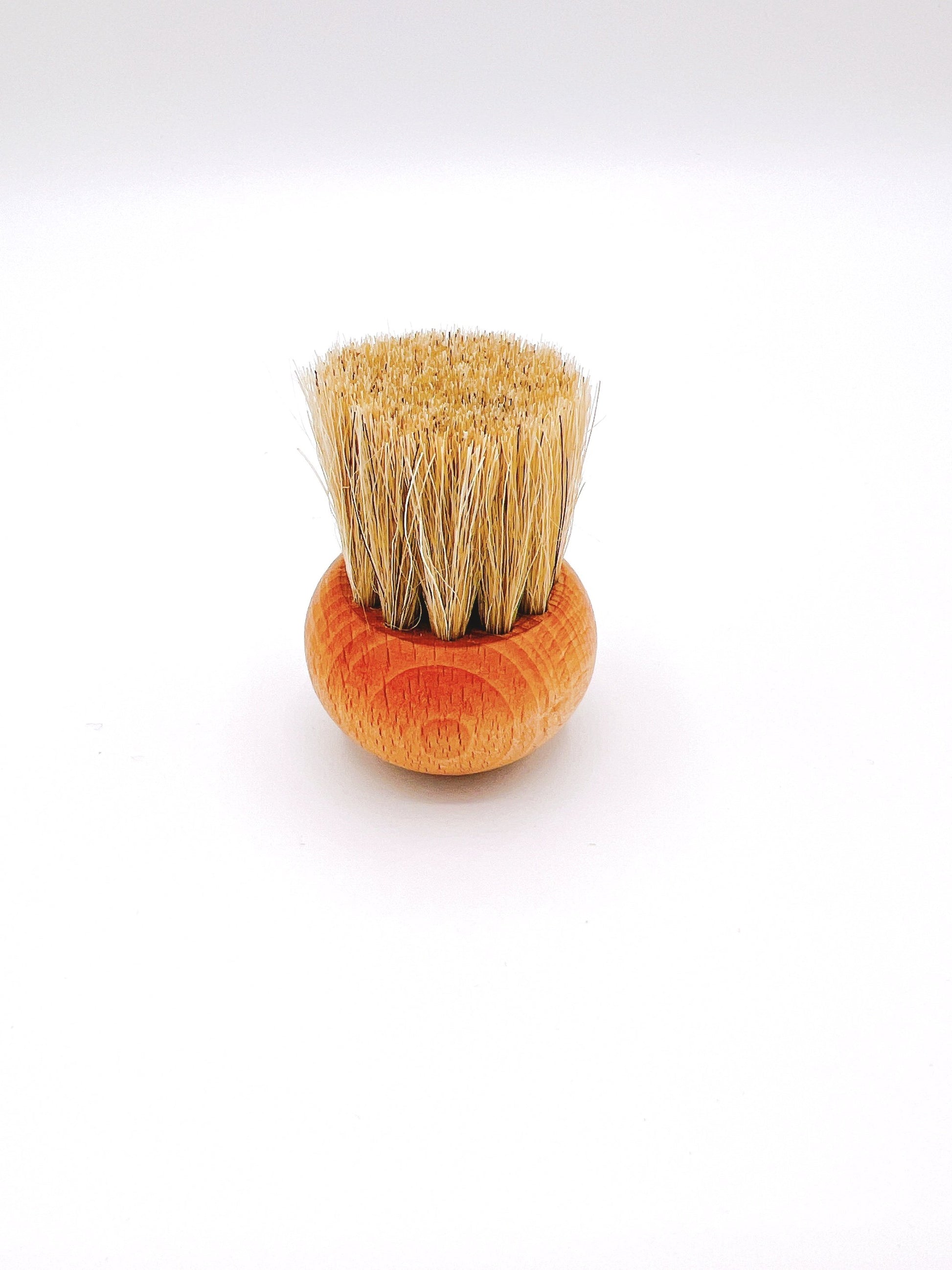 Redecker Mushroom Brush is a natural bristle brush for gently cleaning mushrooms.