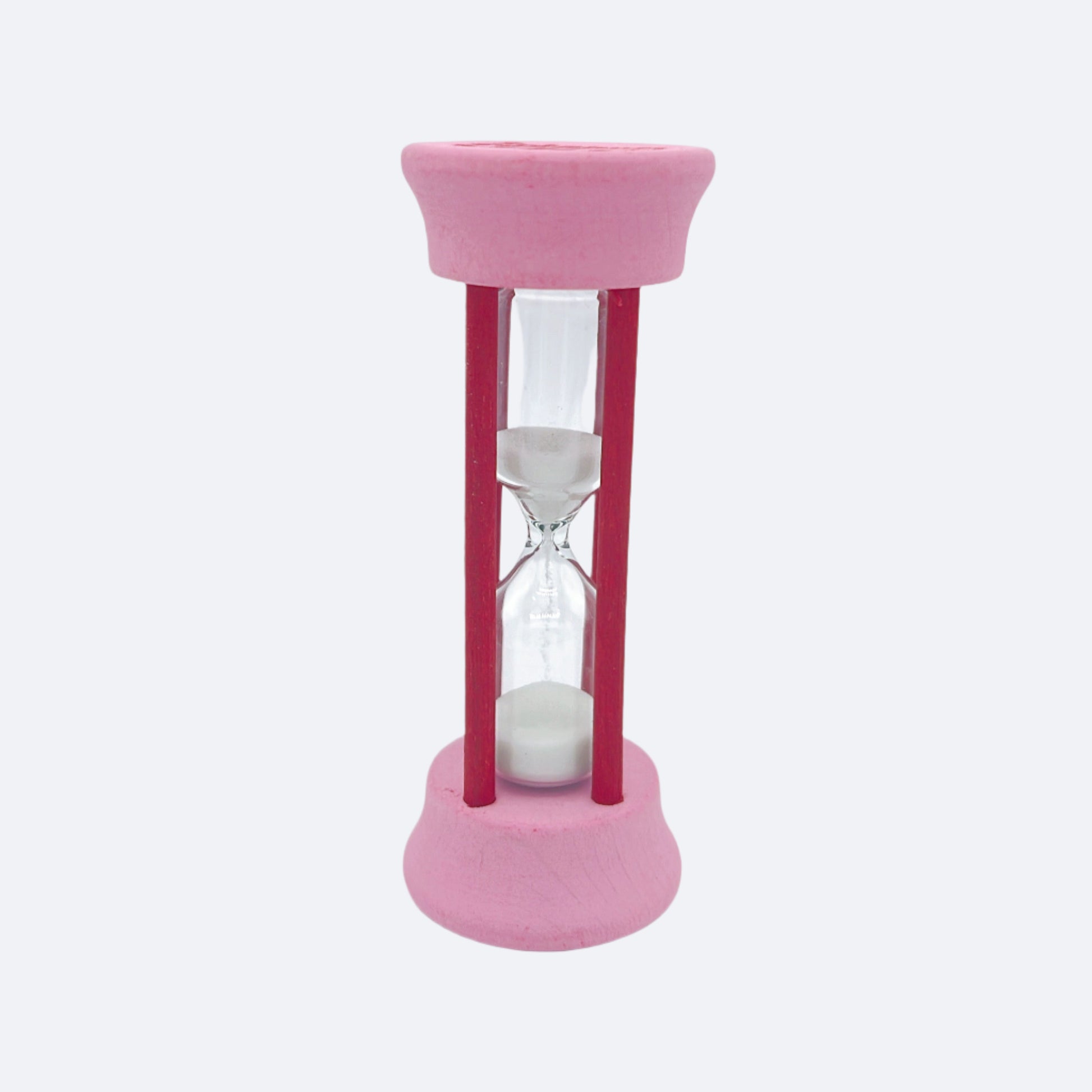 Fun, hourglass-shaped pink tooth timer to encourage proper brushing time for kids and adults. Ideal for daily dental routines.