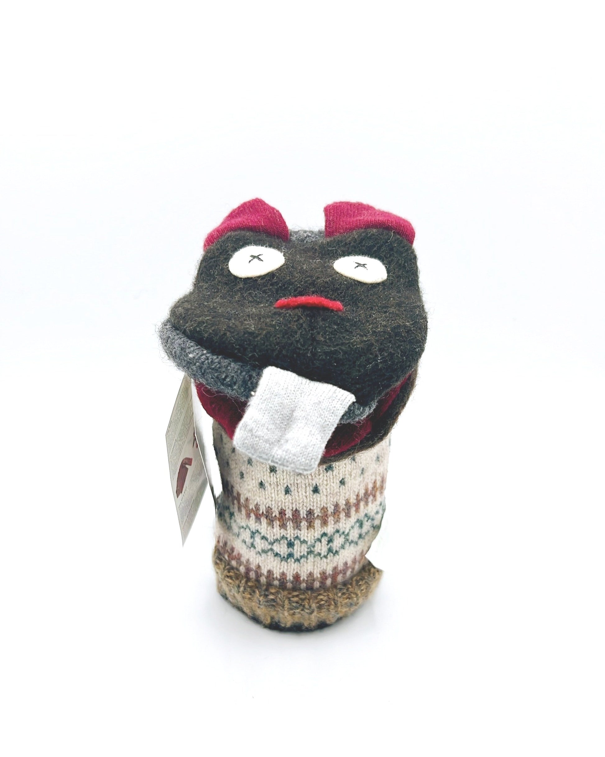 Handmade, eco-friendly puppets crafted from reclaimed sweaters, unique and sustainable toys.