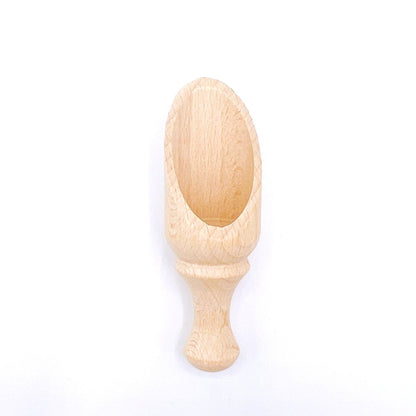 Eco-friendly Redecker wooden coffee scoops, perfect for measuring and serving your favorite coffee grounds.