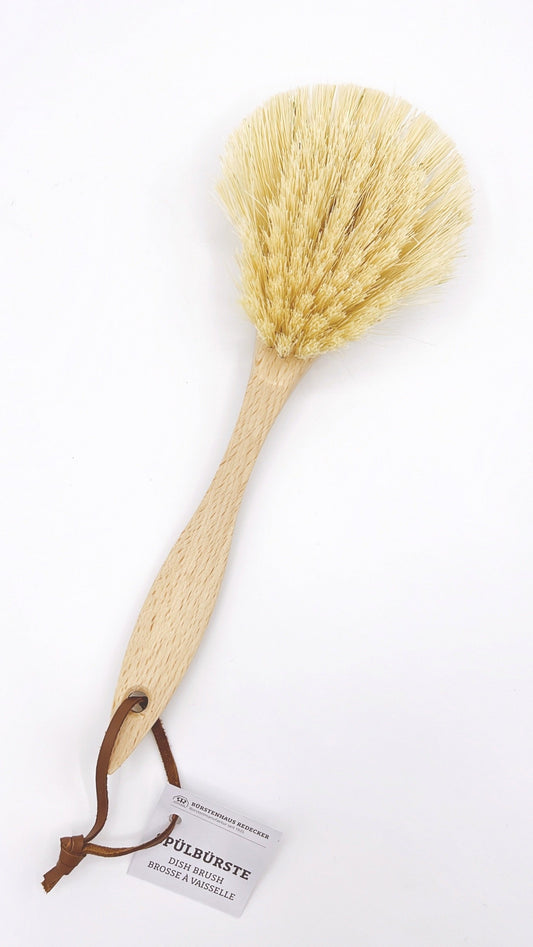 Redecker Dish Brush with natural bristles and wooden handle, ideal for effective and eco-friendly dish cleaning.