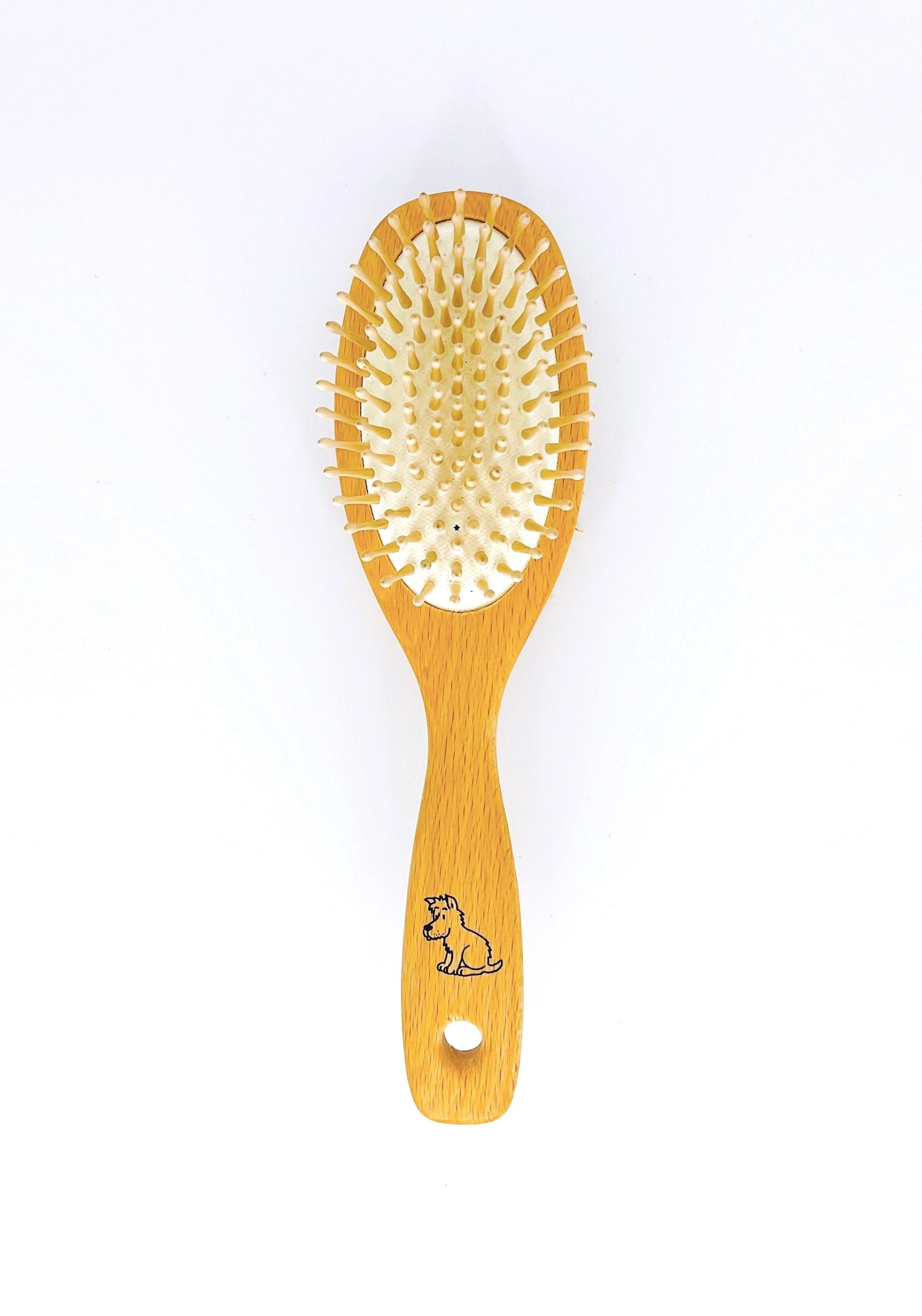 Redecker Dog Brush is a high-quality wooden brush with soft bristles, perfect for gentle grooming and detangling your pet's fur.