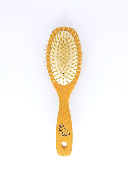 Redecker Dog Brush is a high-quality wooden brush with soft bristles, perfect for gentle grooming and detangling your pet's fur.