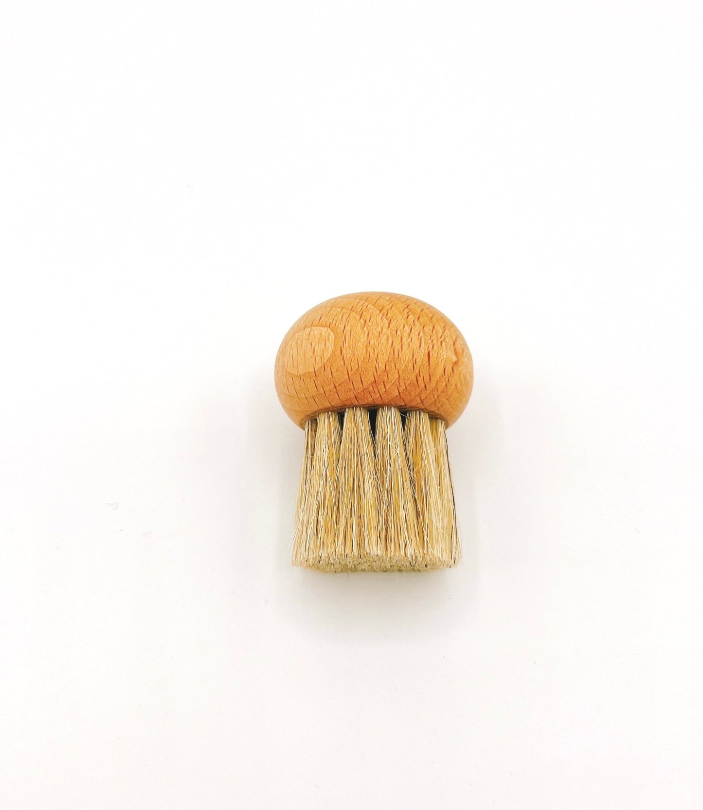 Redecker Mushroom Brush is a natural bristle brush for gently cleaning mushrooms.