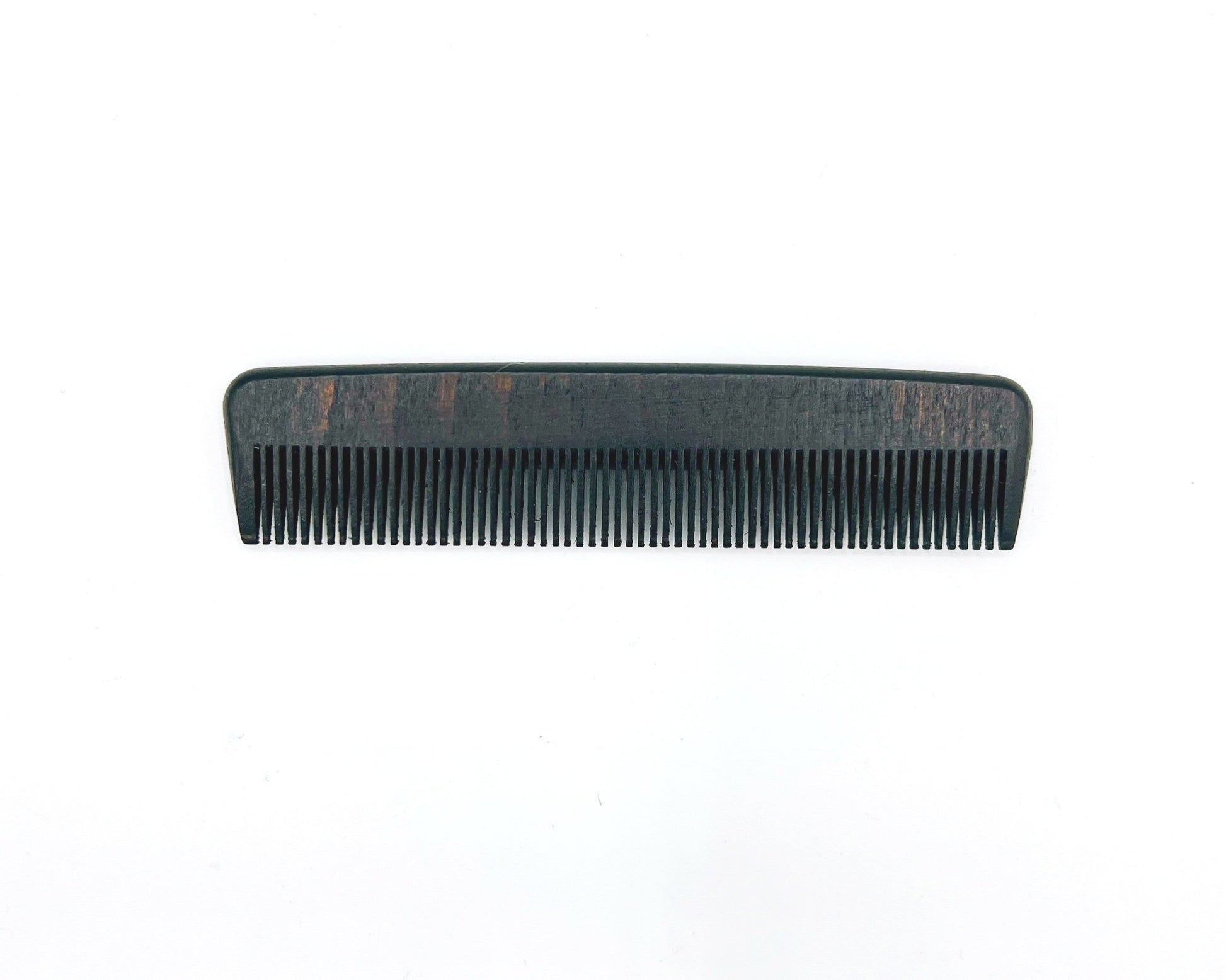 Redecker Wood Pocket Comb is a handcrafted wooden comb, compact size for easy carrying, perfect for styling and maintaining hair on the go.