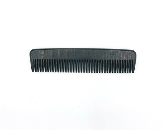 Redecker Wood Pocket Comb is a handcrafted wooden comb, compact size for easy carrying, perfect for styling and maintaining hair on the go.