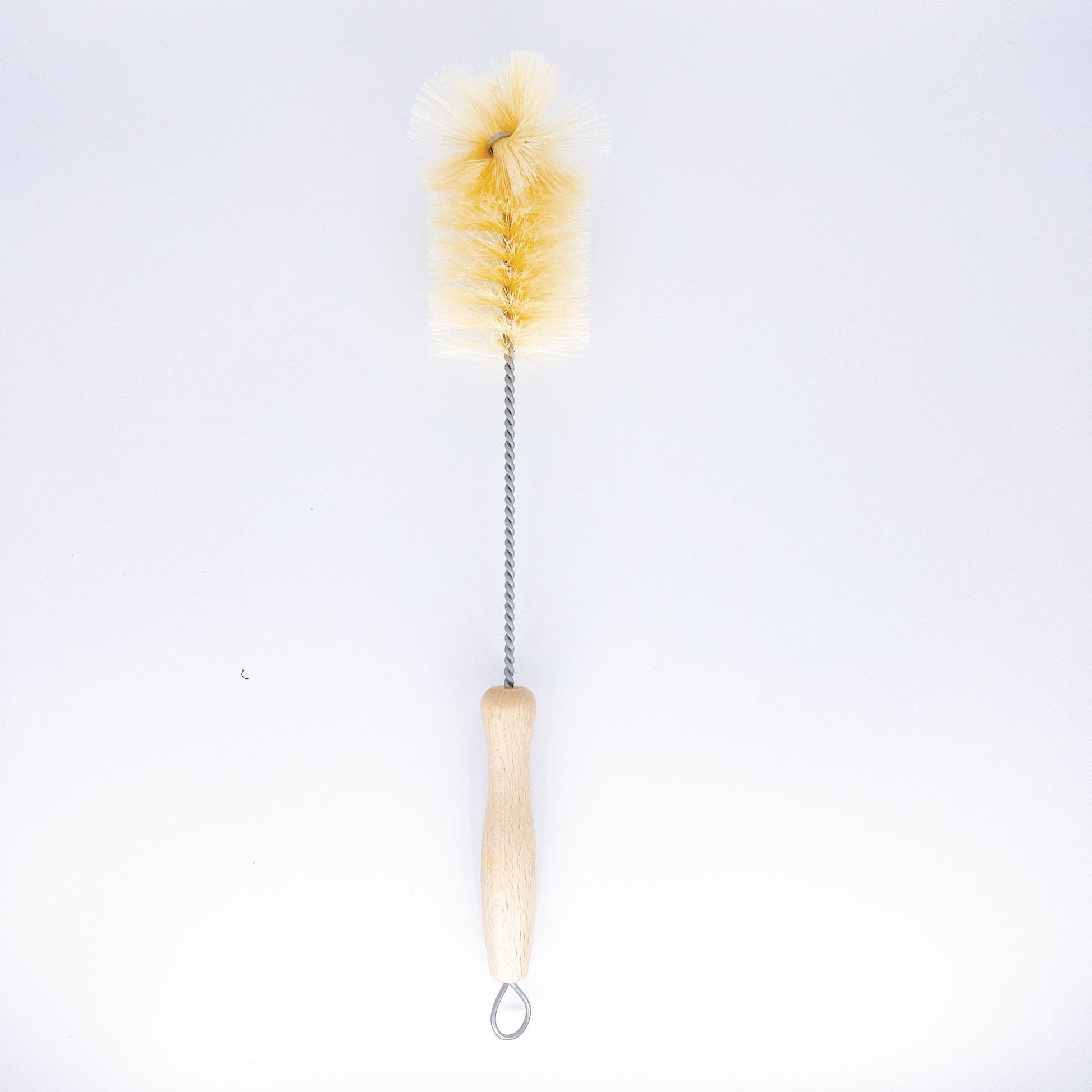 Long handle brush with stiff bristles, ideal for cleaning narrow and hard-to-reach areas in bottles.