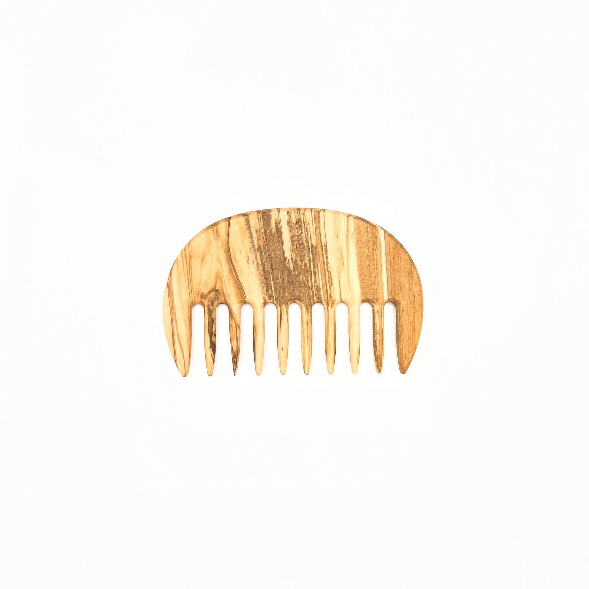 Redecker natural wooden comb designed for detangling thick, curly, or wet hair gently and effectively. Eco-friendly.