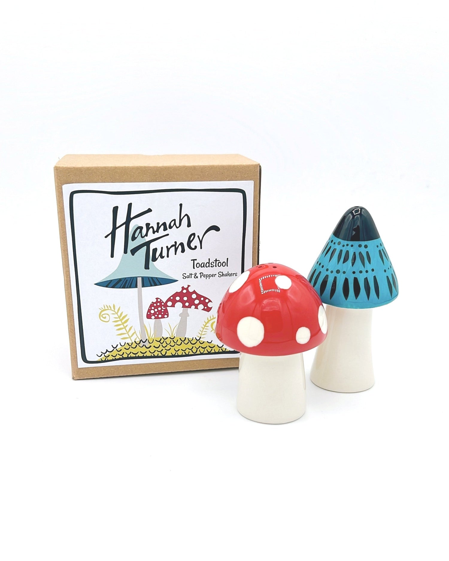 Charming ceramic shakers in a whimsical toadstool design, perfect for adding fun to any table.